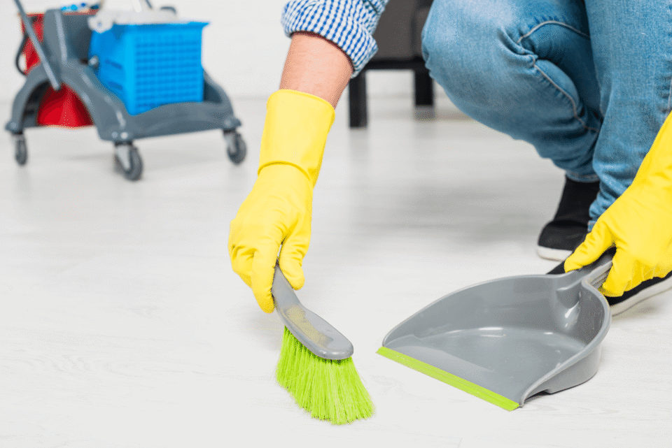 man cleaning his home